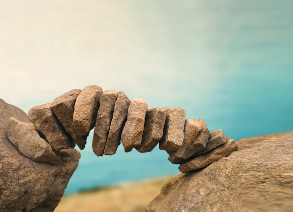 Rocks are connected to build a bridge